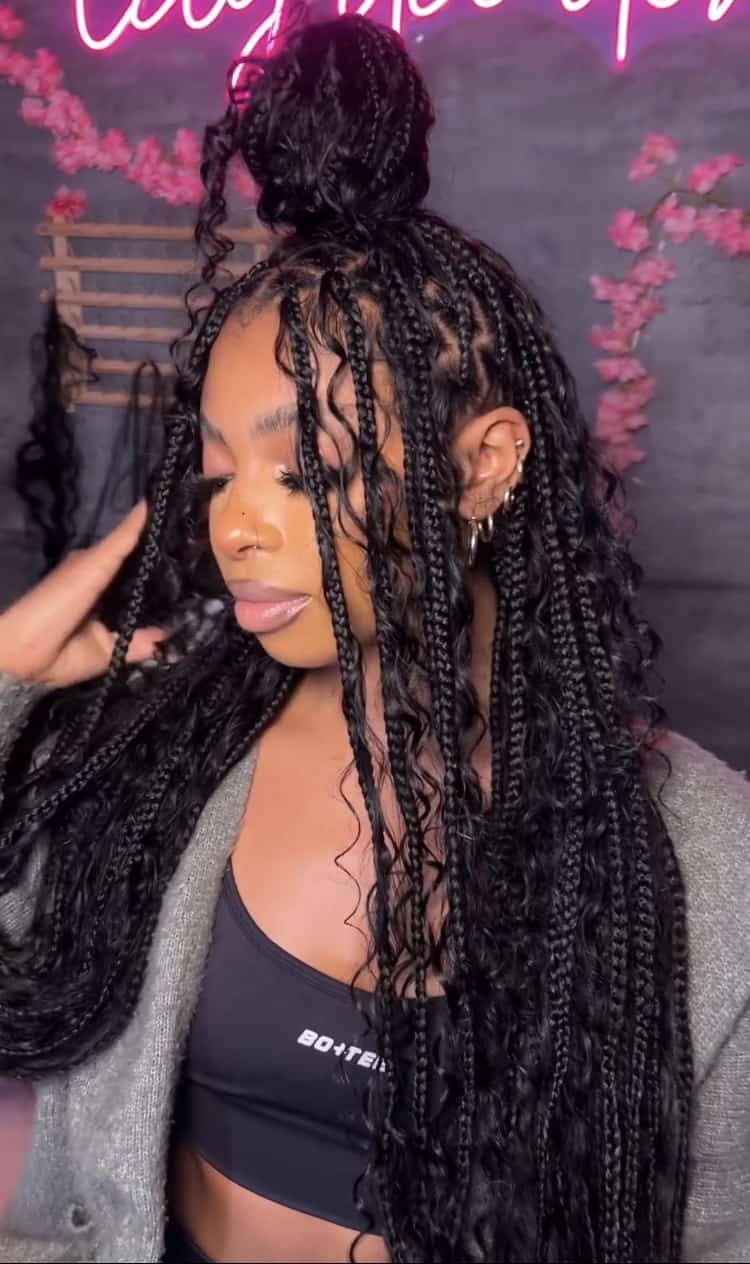 Bohemian box braids with messy top knot