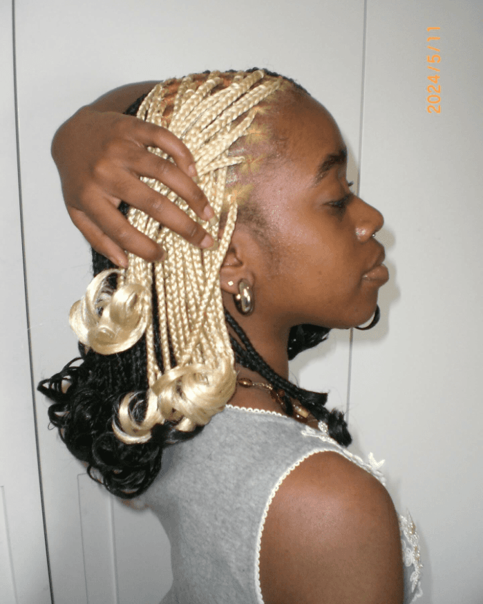 Blonde braids with curled ends, mixed textures