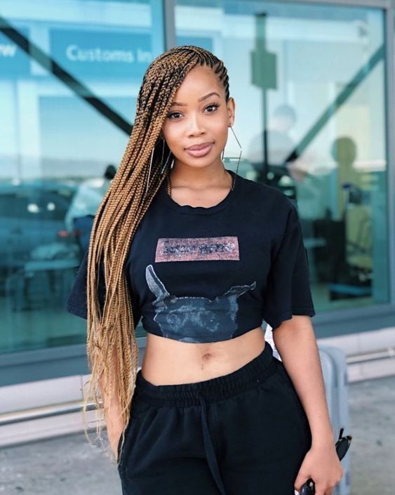 Long blonde side braids, sleek and elegant