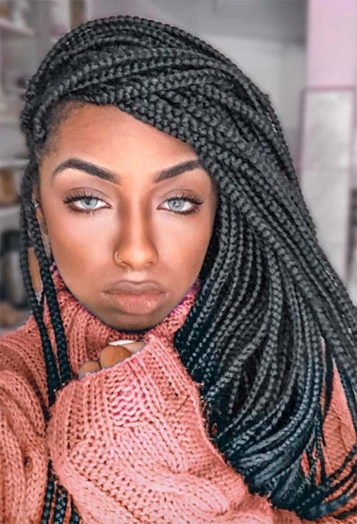 Side-swept box braids, bold and stylish