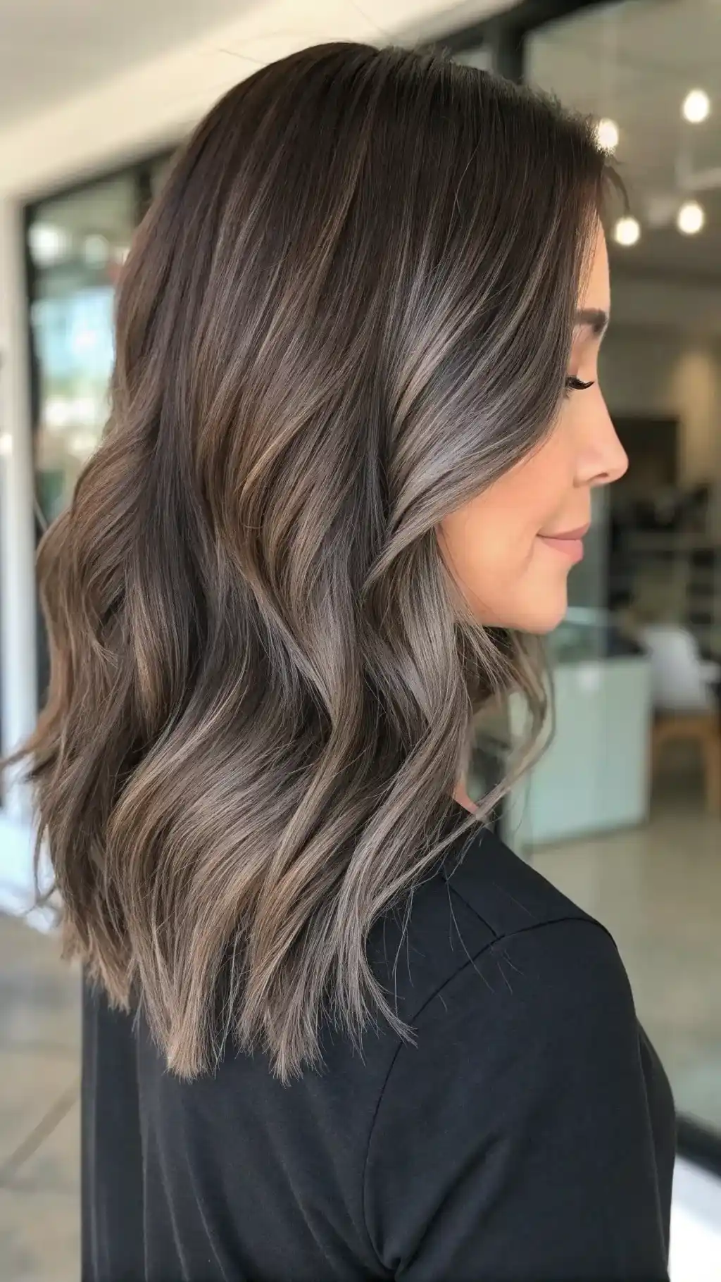 Sophisticated ash brown waves with highlights