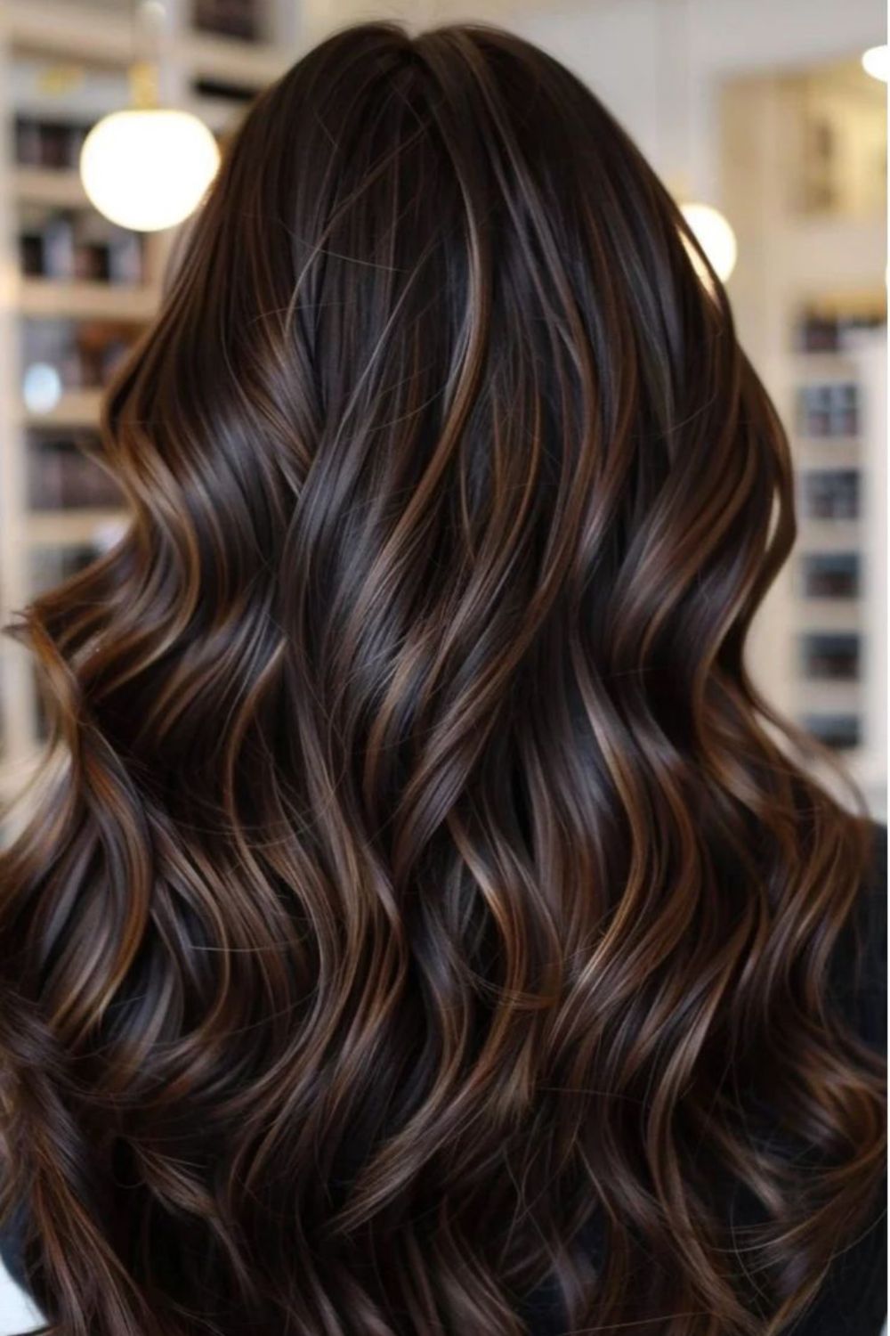 Glossy brunette waves with rich balayage