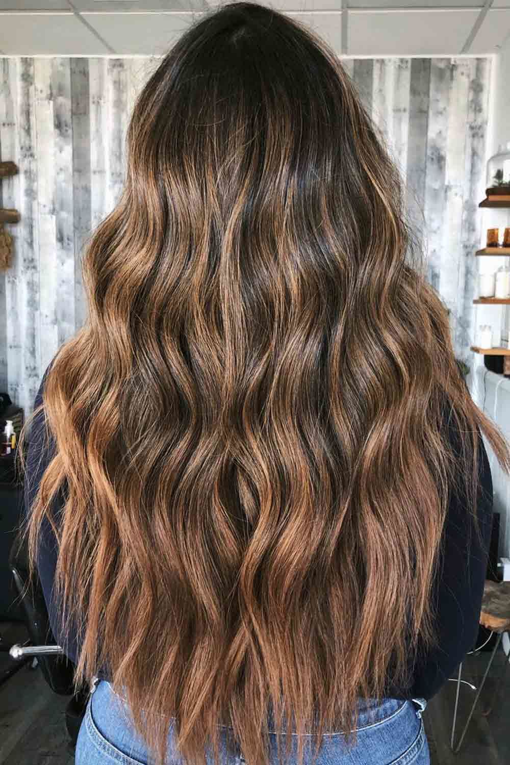 Voluminous beach waves with balayage highlights