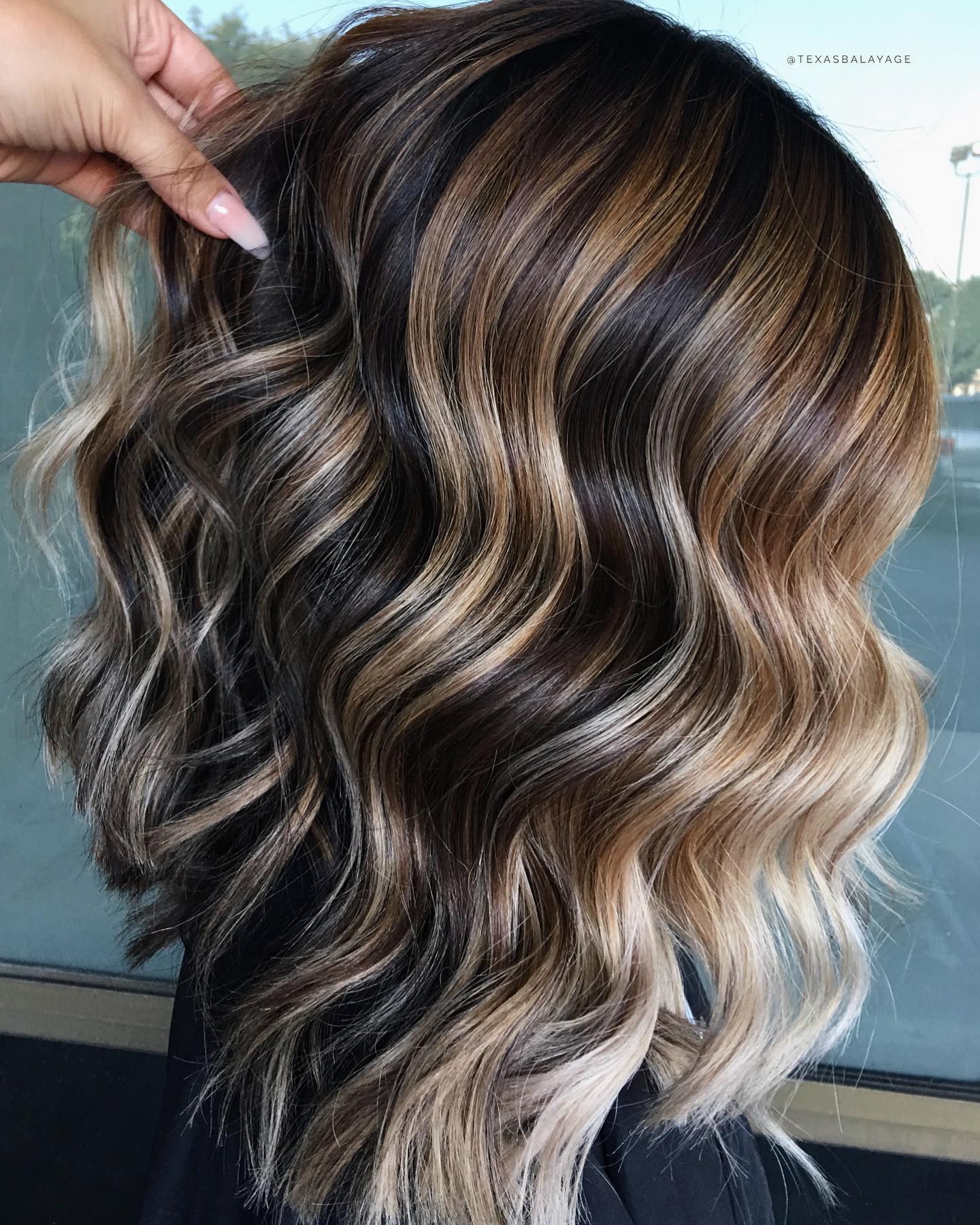 Ash bronde balayage waves with dimension