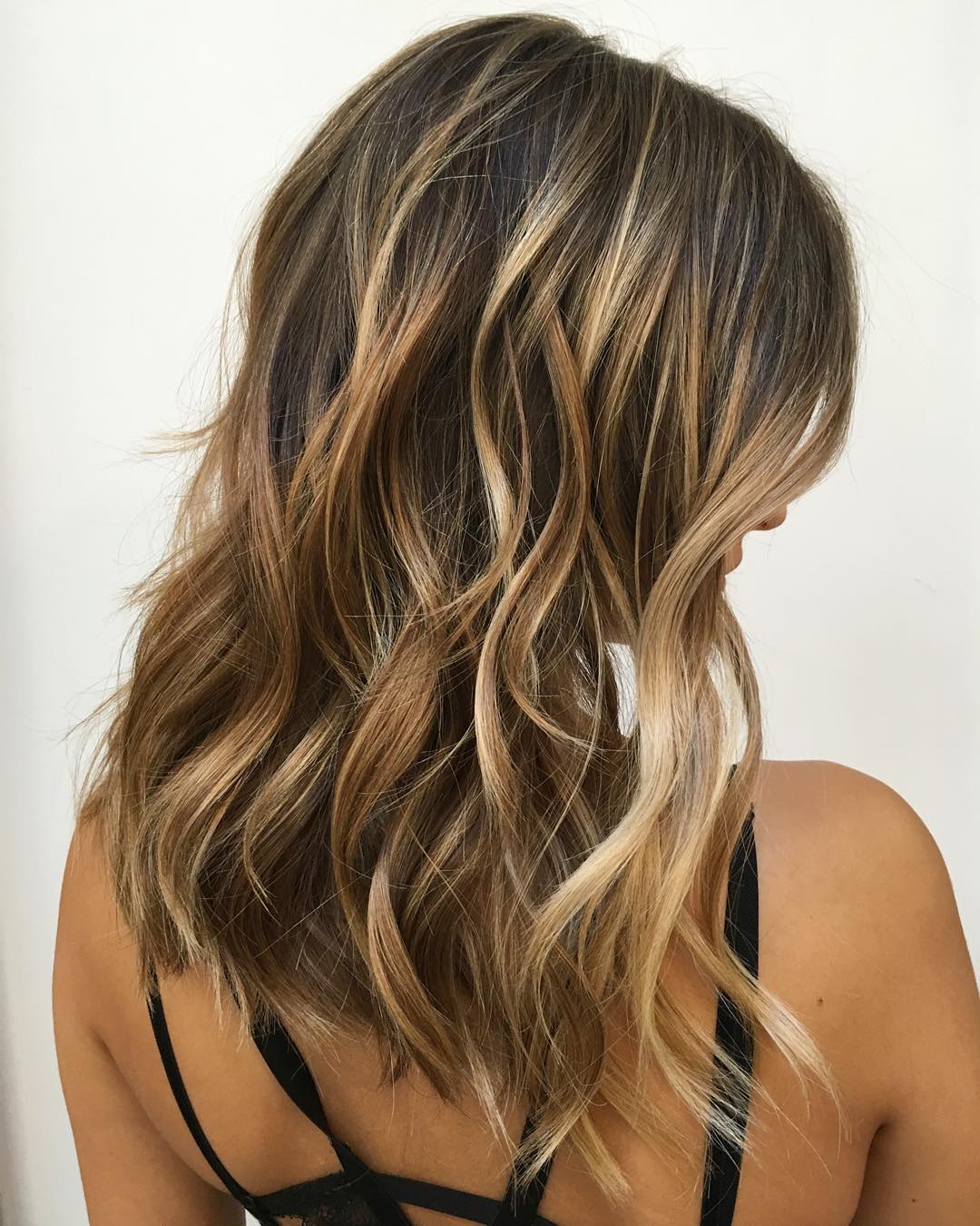 Textured blonde lob with balayage highlights