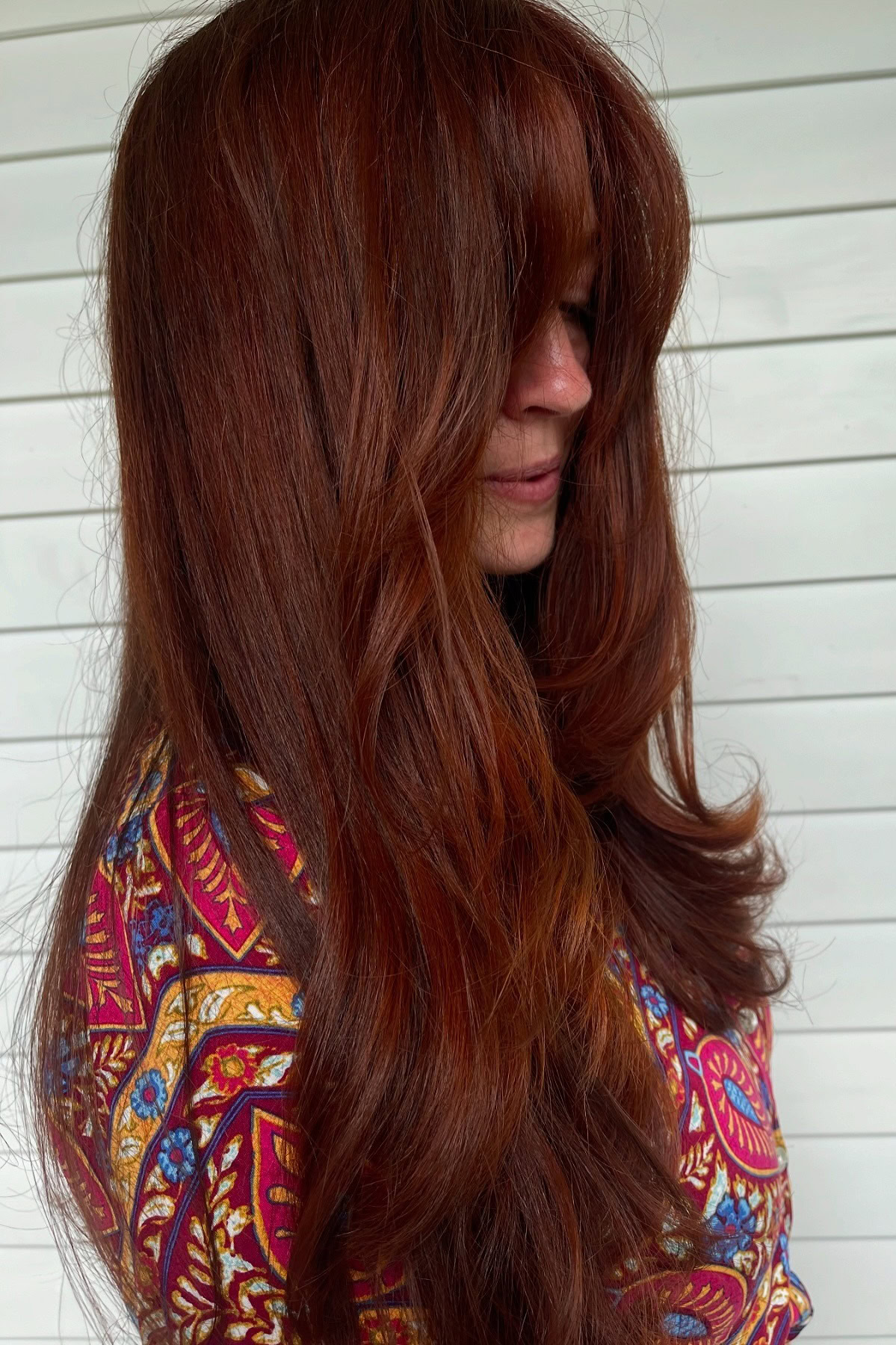 Long cherry tresses with fringe and layers