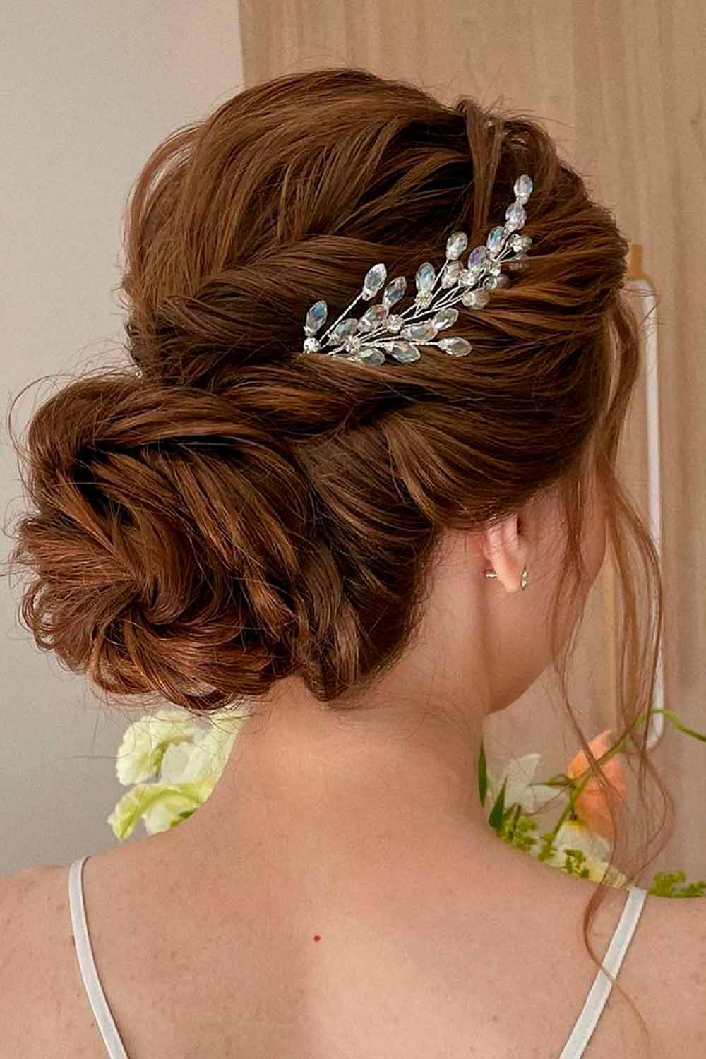 Elegant bridal updo with cherry hair color