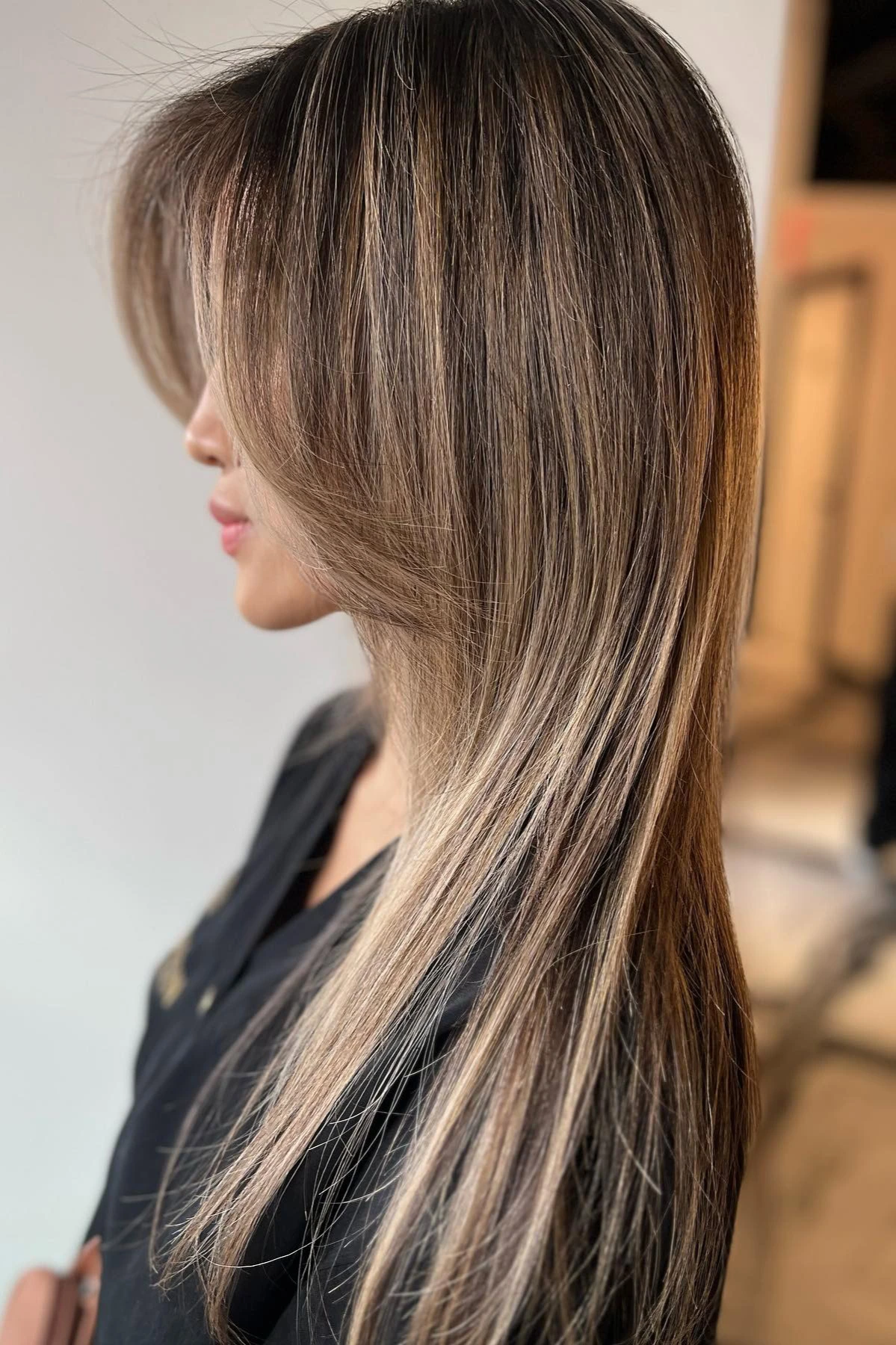 Long sleek hair with ash blonde highlights