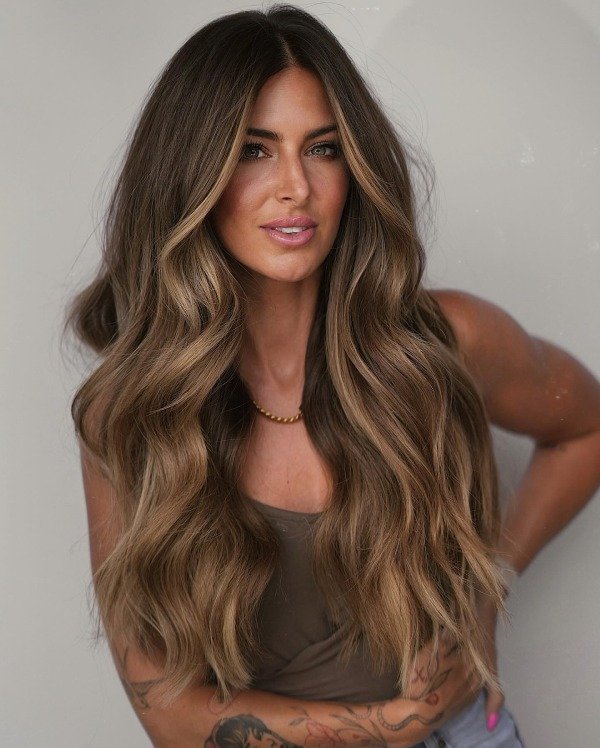 Long wavy hair with golden highlights