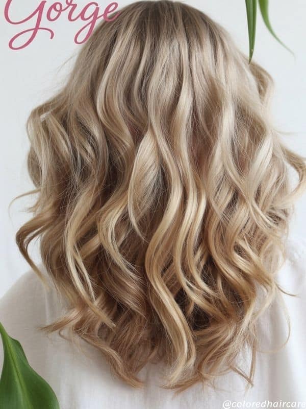 Soft waves dirty blonde with highlights