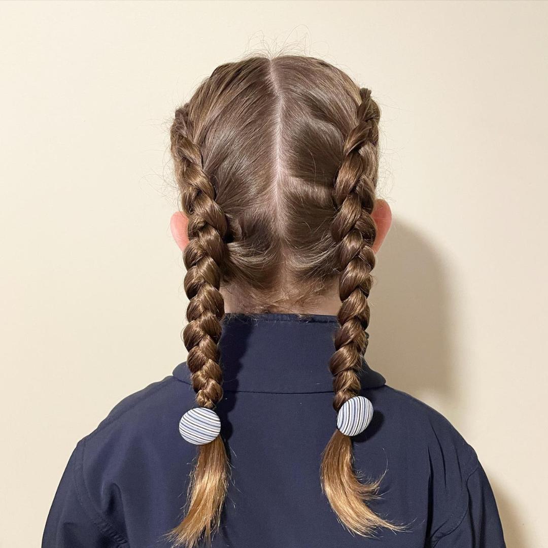 Classic double braid hairstyle for a traditional Easter look