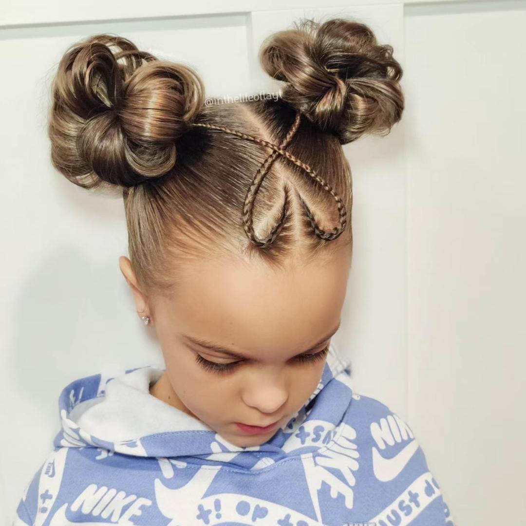 Futuristic space buns with intricate braids for a bold Easter style