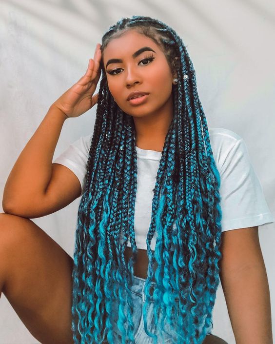 Vibrant blue ombre Fulani braids with loose curls