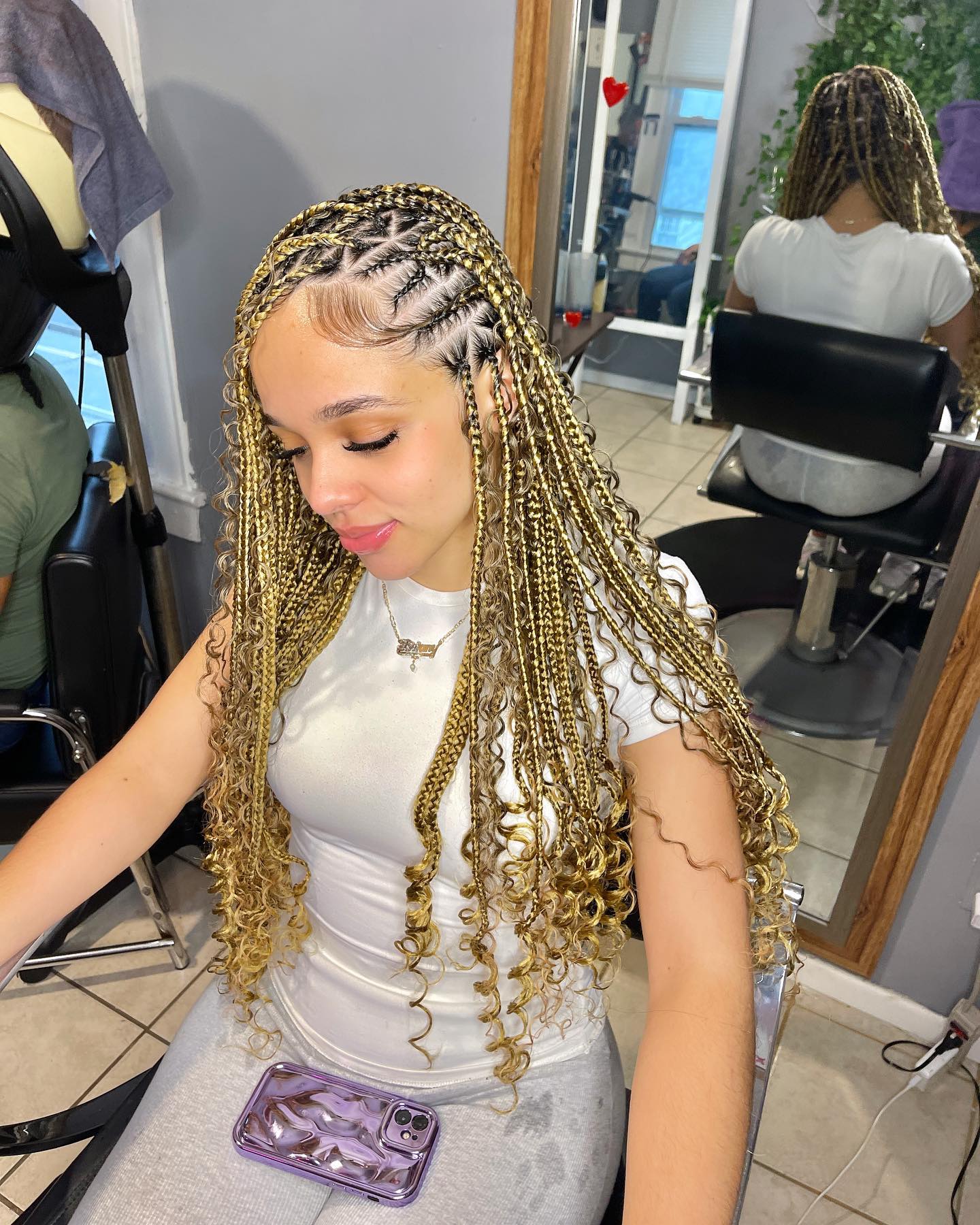 Golden Fulani braids with curls and highlights