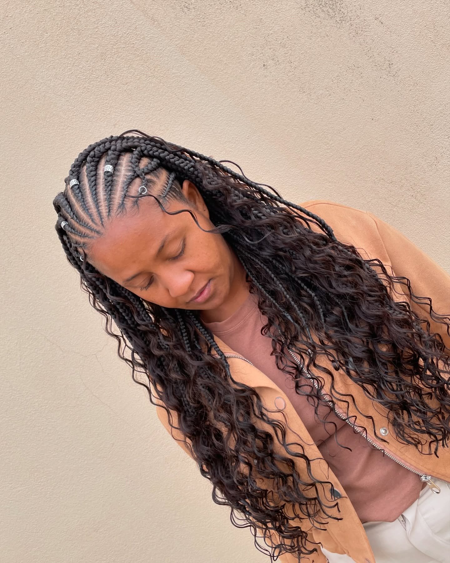 Long Fulani braids with defined curls and beads