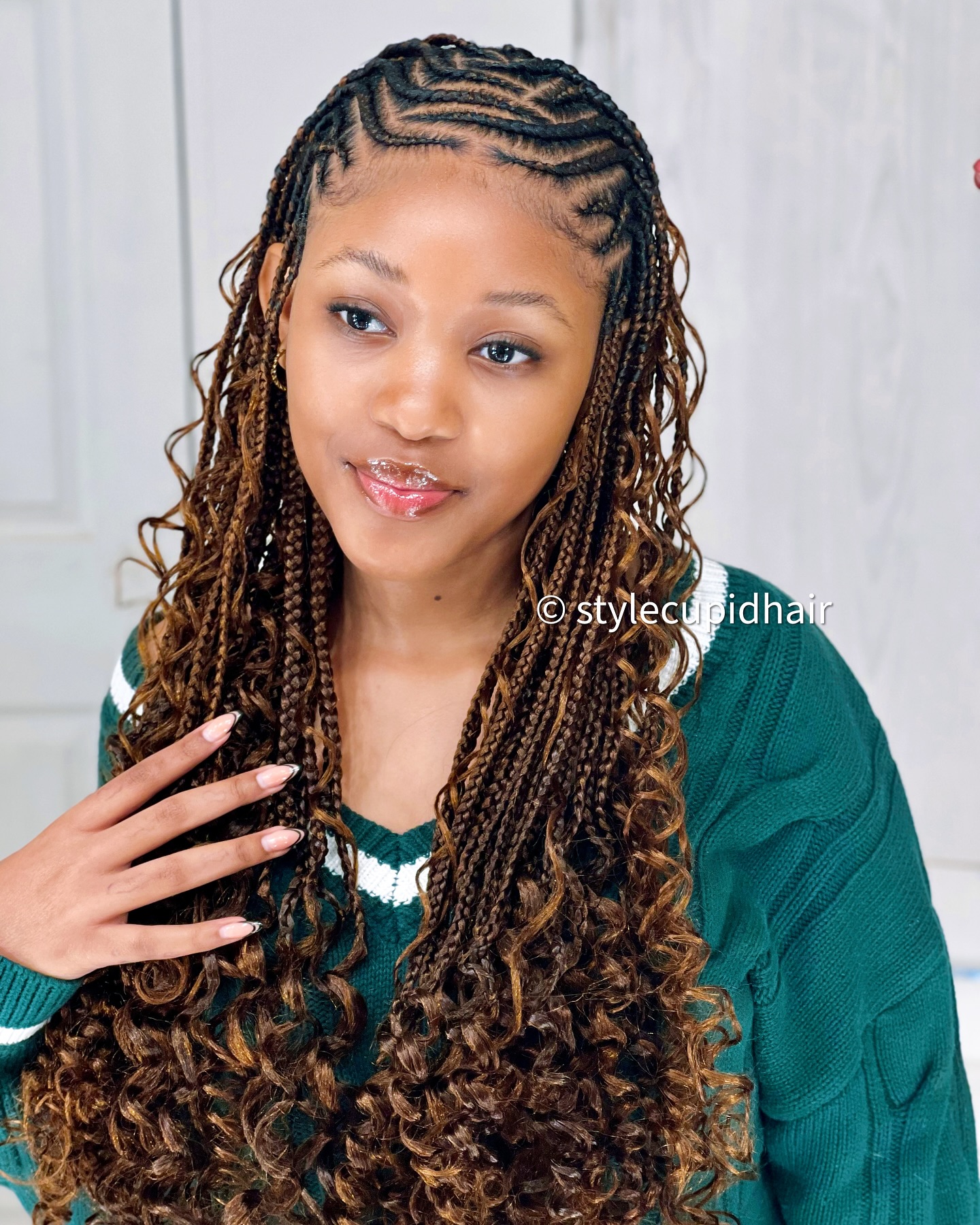 Fulani braids with spiral curls and sleek finish