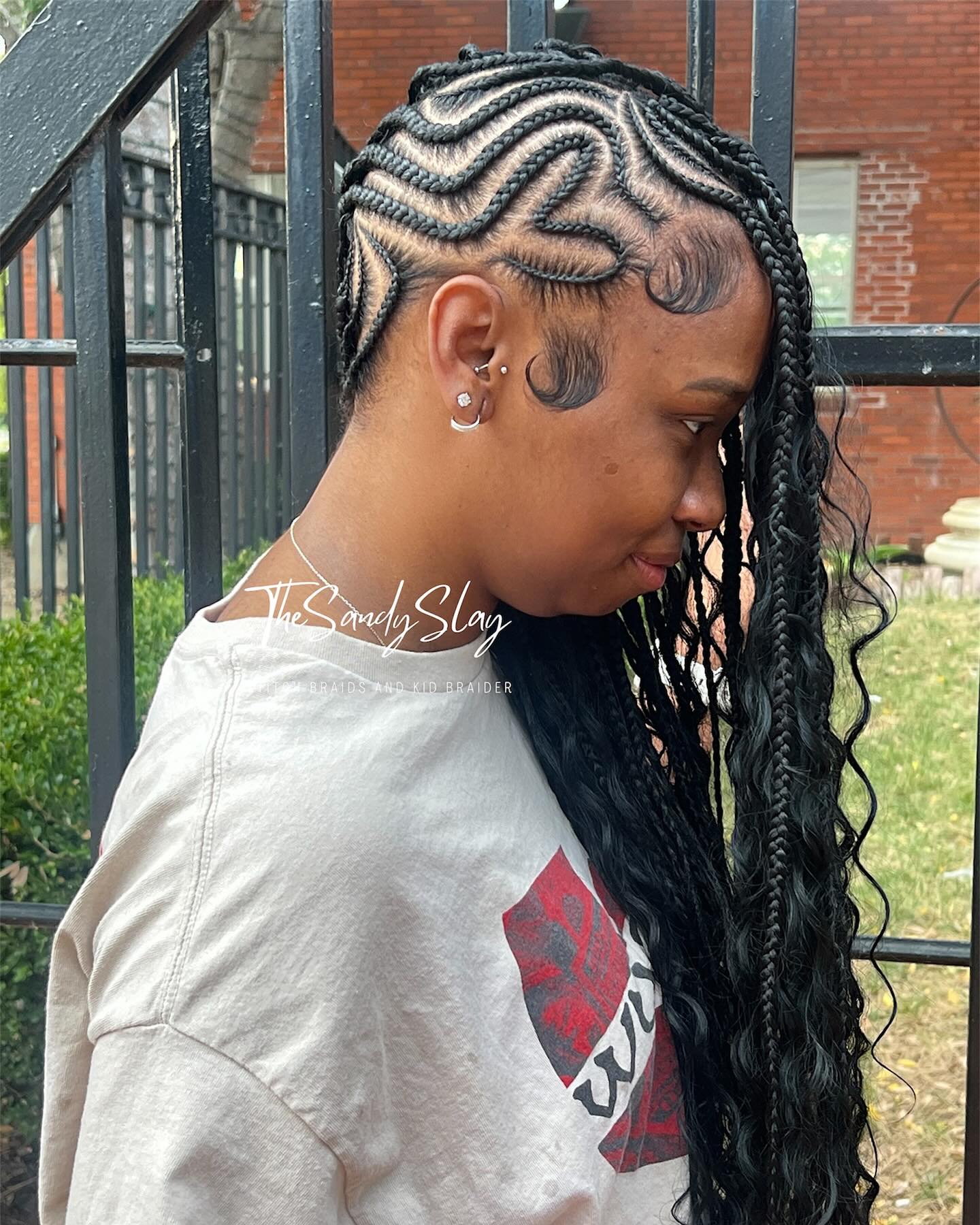 Wave pattern Fulani braids with side parting