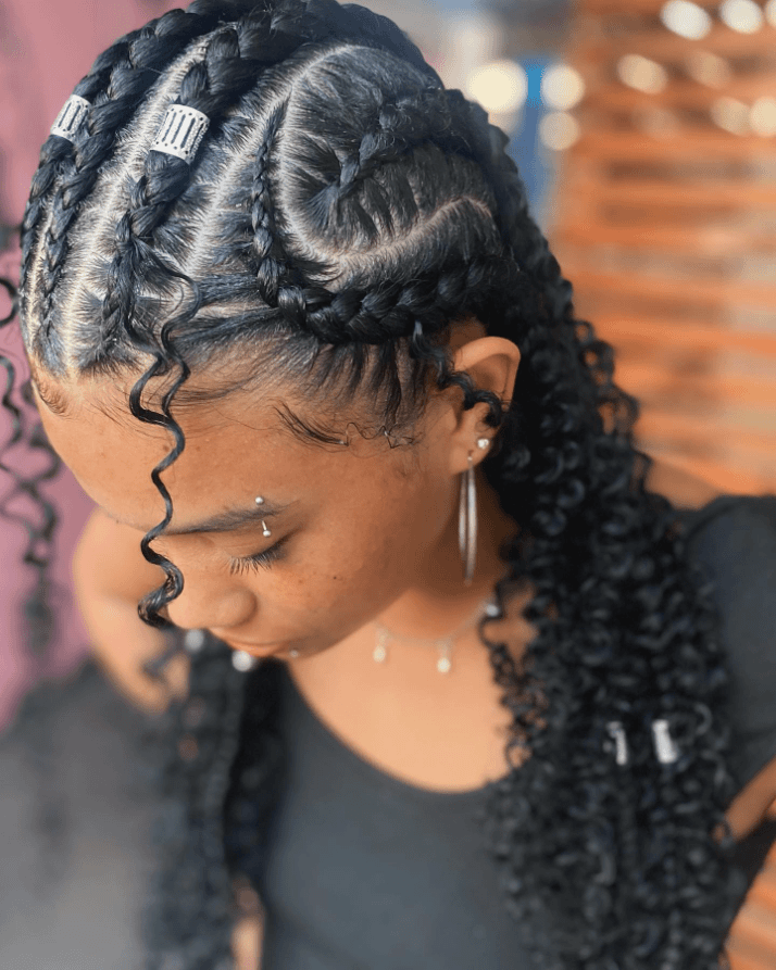 Fulani braids with curly ends and intricate pattern
