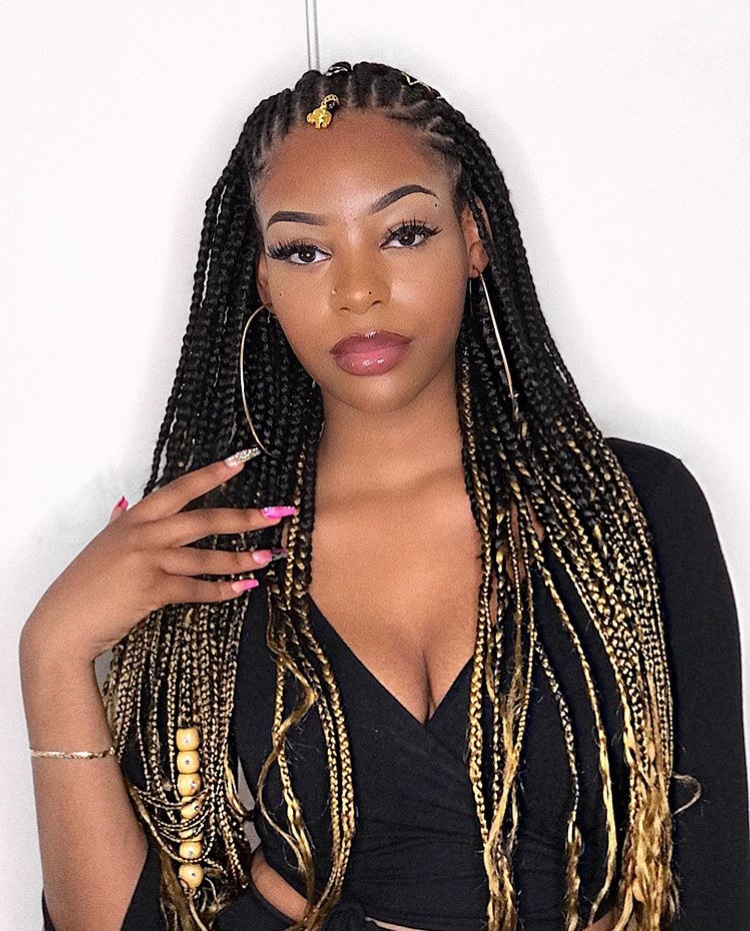 Highlighted Fulani braids with golden beads and accents