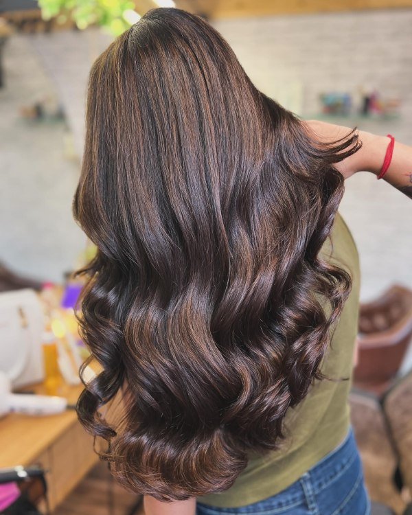 Lustrous brunette waves with dimension