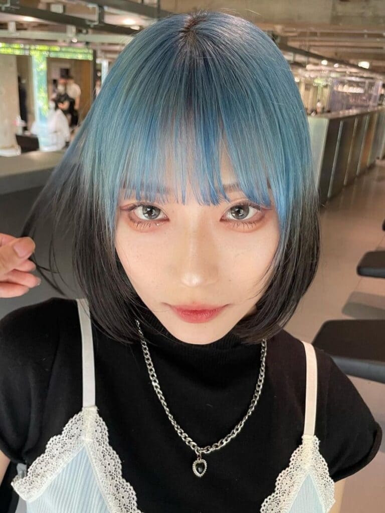 Blue and black bob with bangs