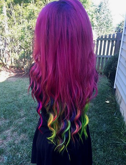 Bright rainbow hair with cascading waves