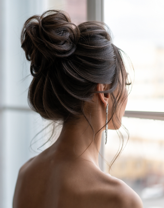 Elegant high bun with sleek finish