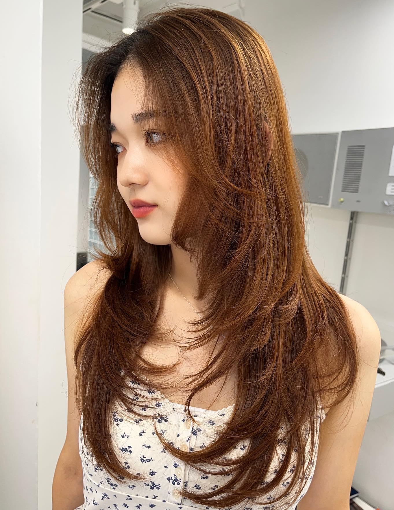 Warm auburn layers glossy finish