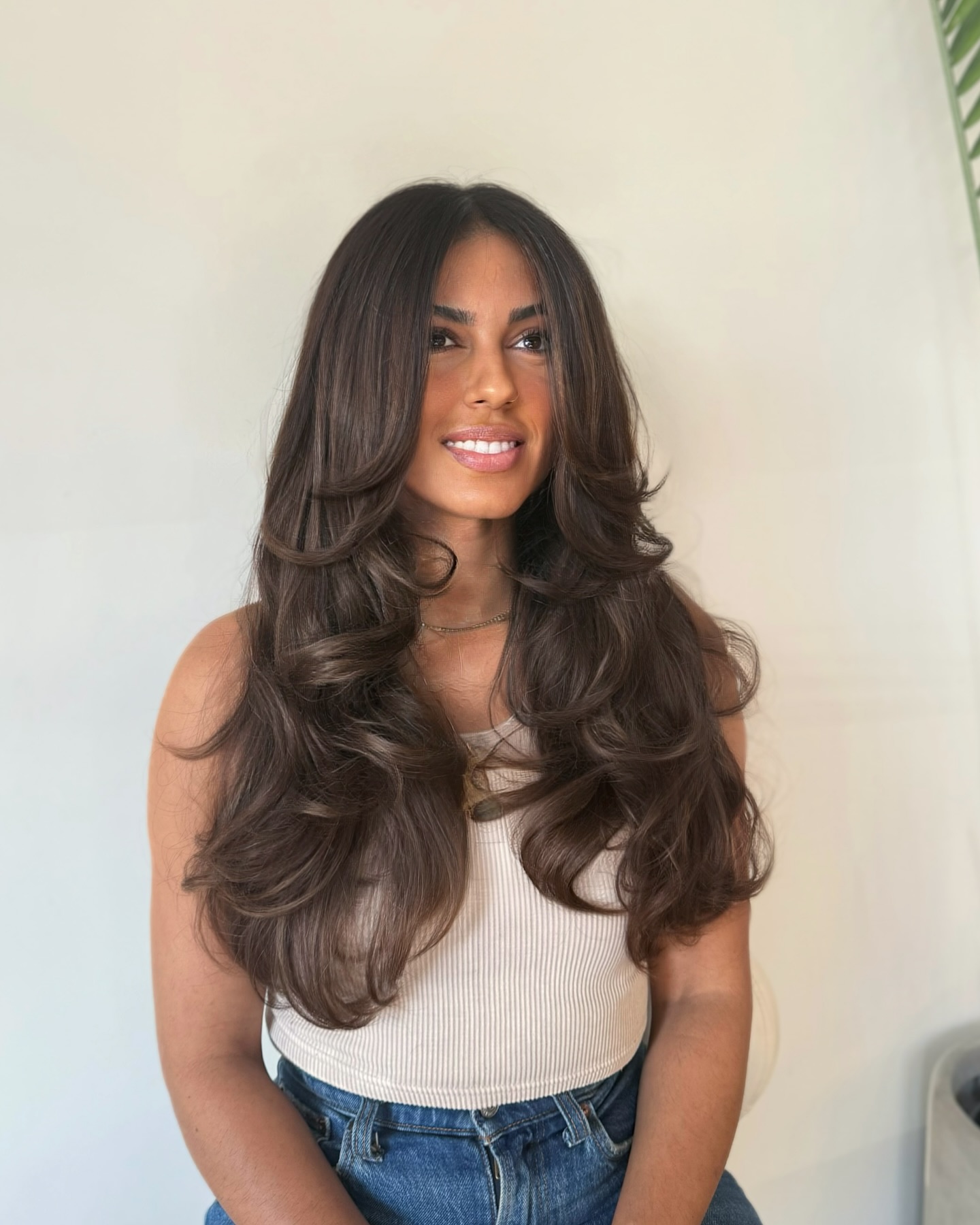 Rich brunette layers glossy curls