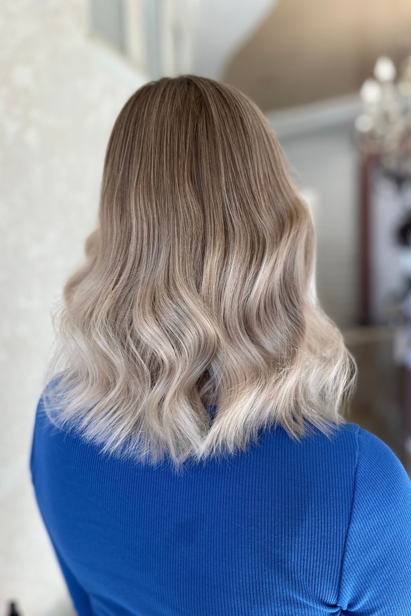 Platinum blonde ombre on medium wavy hair