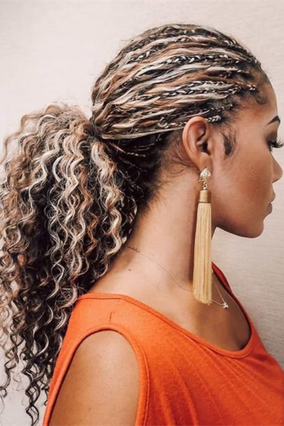 Highlighted curly ponytail with texture