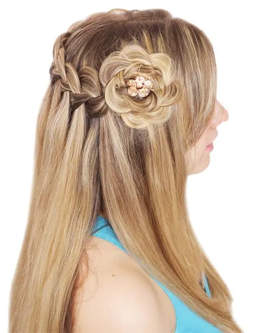 Floral braided half-updo with flower detail