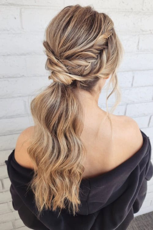 Twisted low ponytail with waves