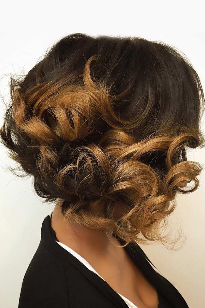 Curly bob with dimensional highlights