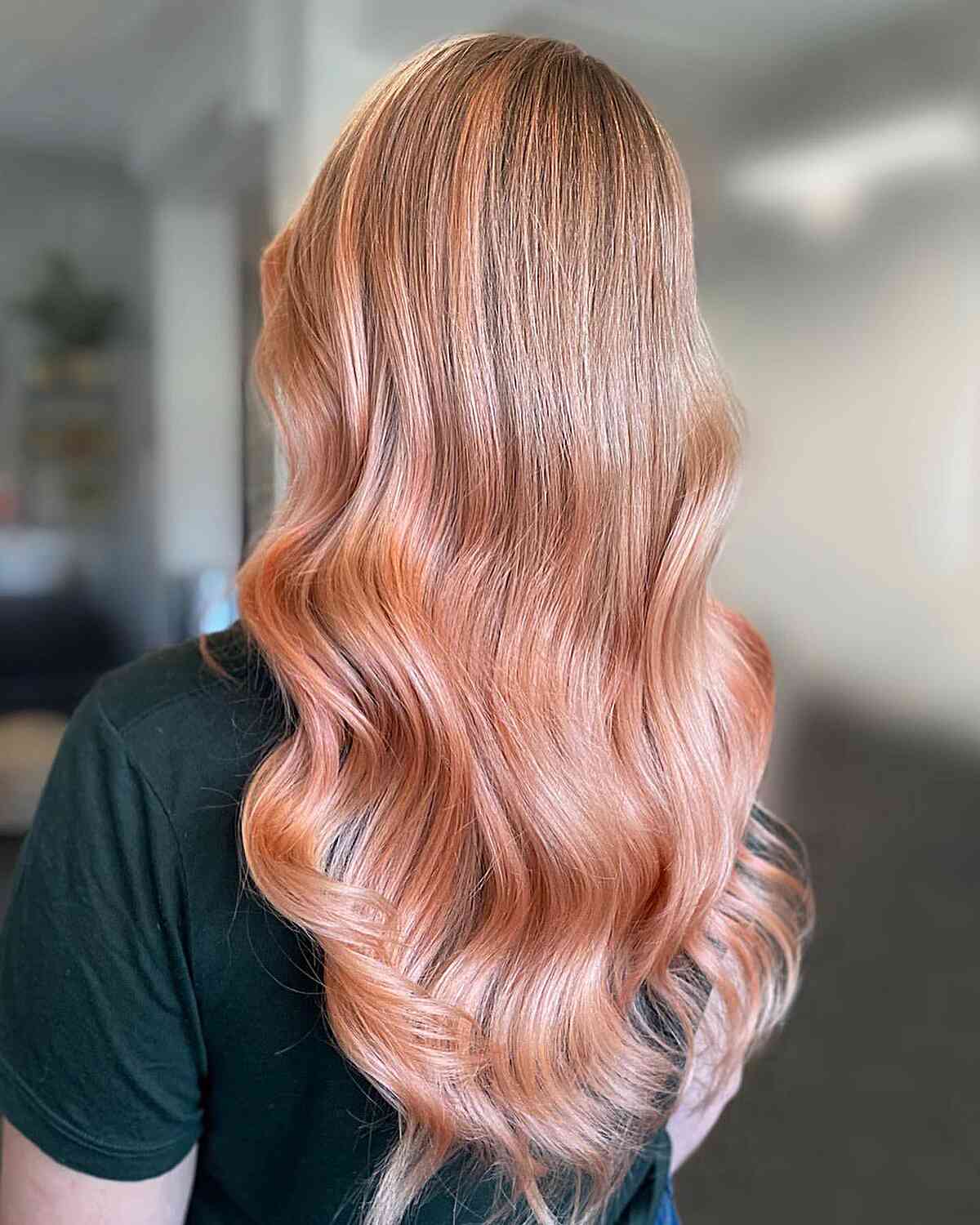 Glossy peach rose gold waves