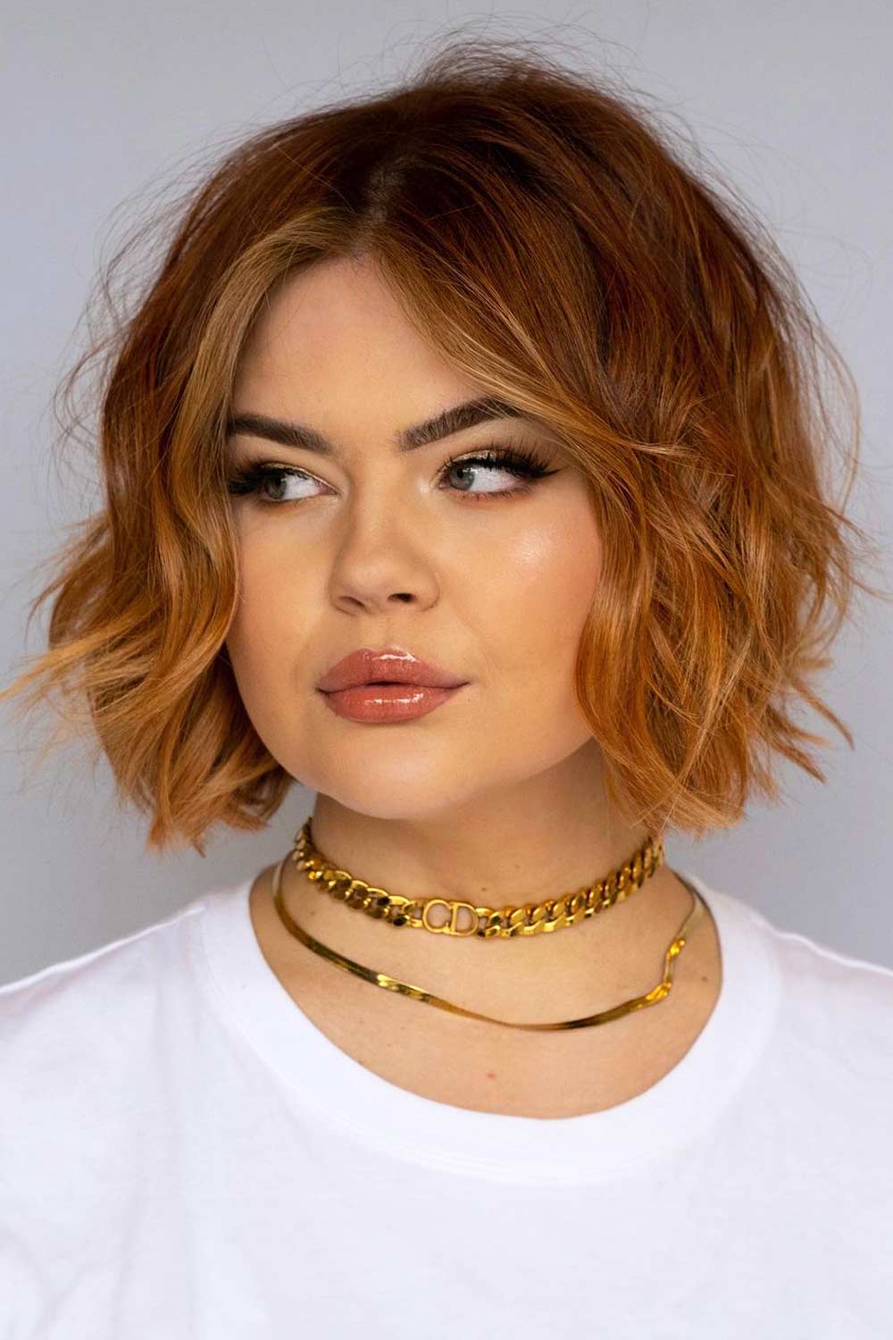 Textured copper bob with waves and volume