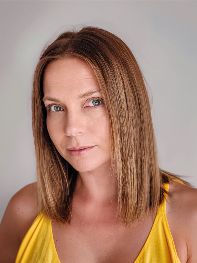 Sleek precision bob with center parting