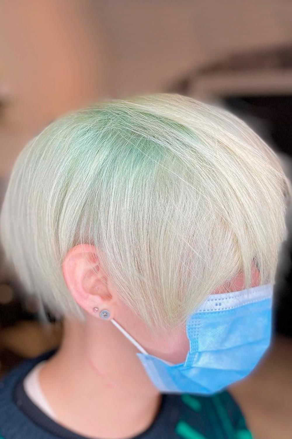 Pastel green pixie cut with layers