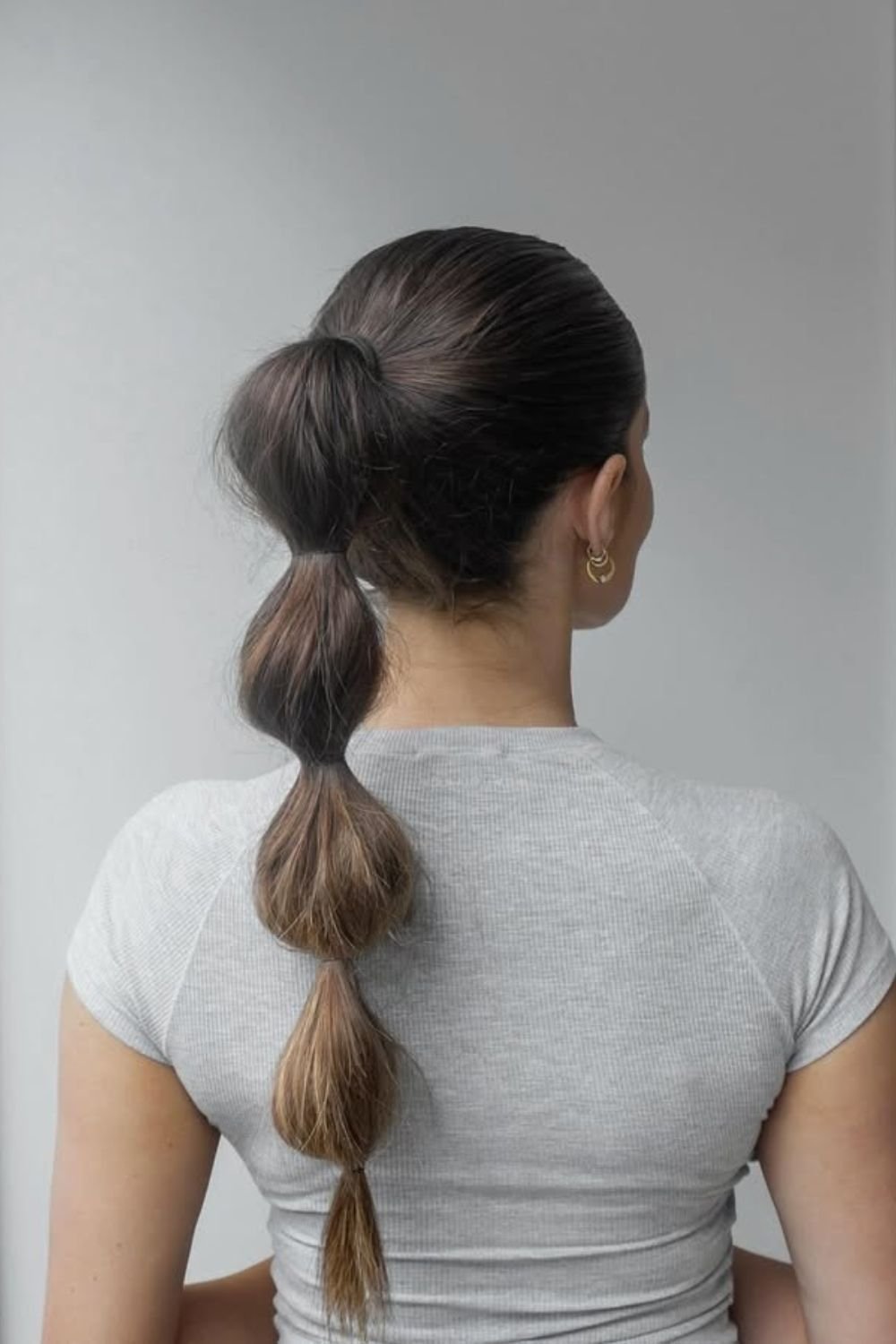 Modern bubble ponytail with volume