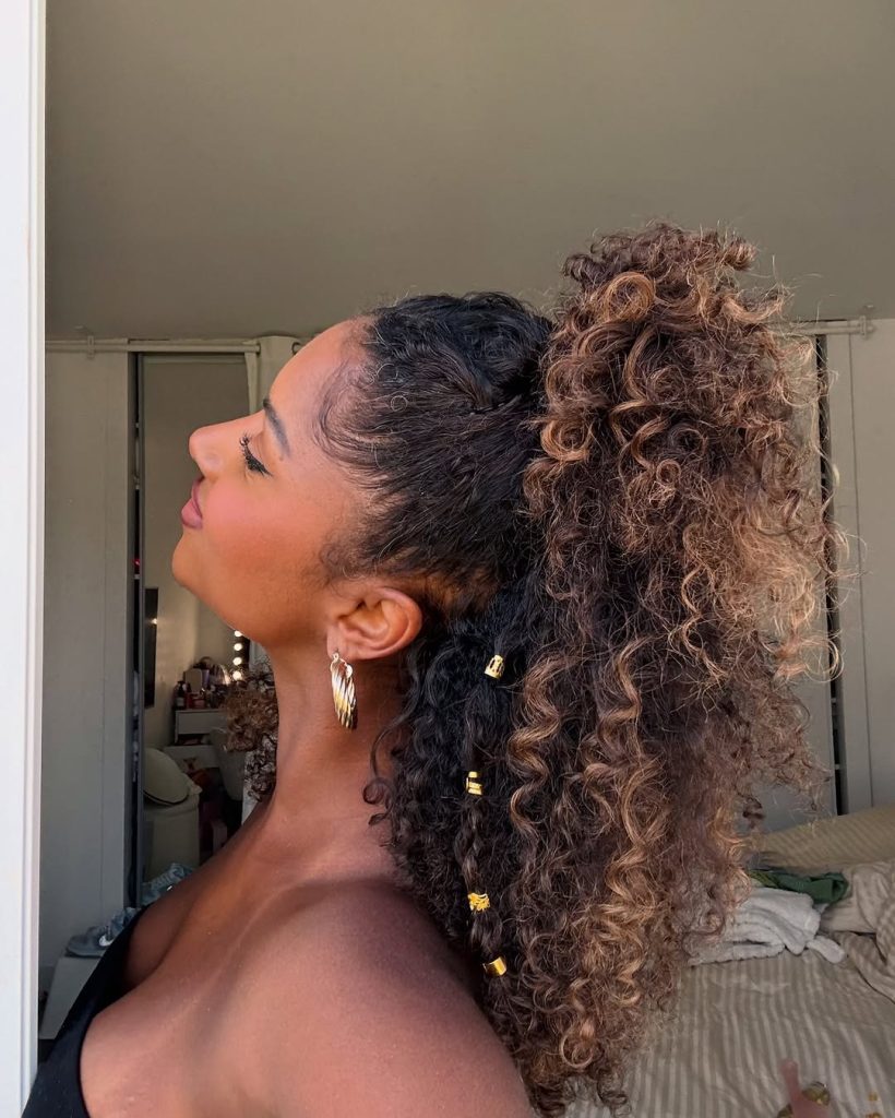 High curly ponytail, vibrant, playful energy, youthful spring style.