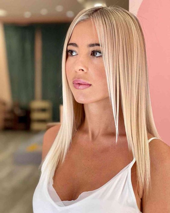 Sleek straight platinum blonde hair, minimalist elegance, trending look
