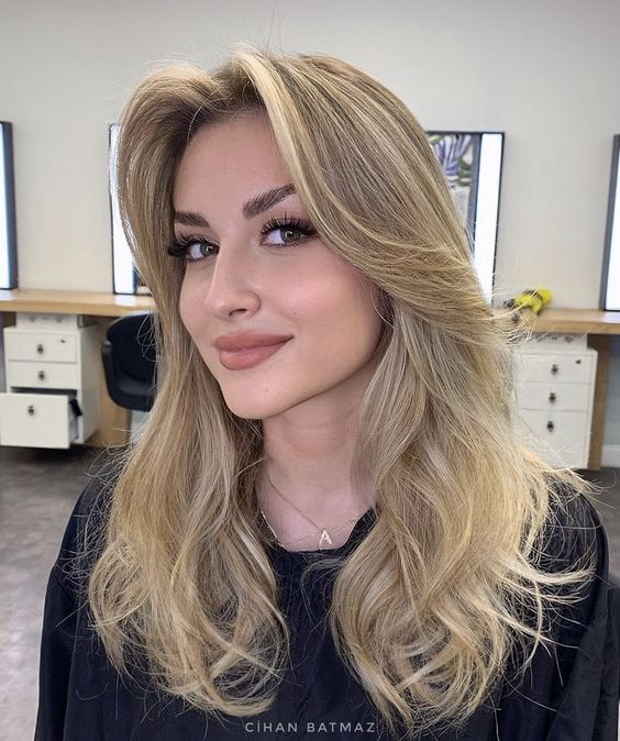 Soft layers with curtain bangs, relaxed and chic, spring haircut