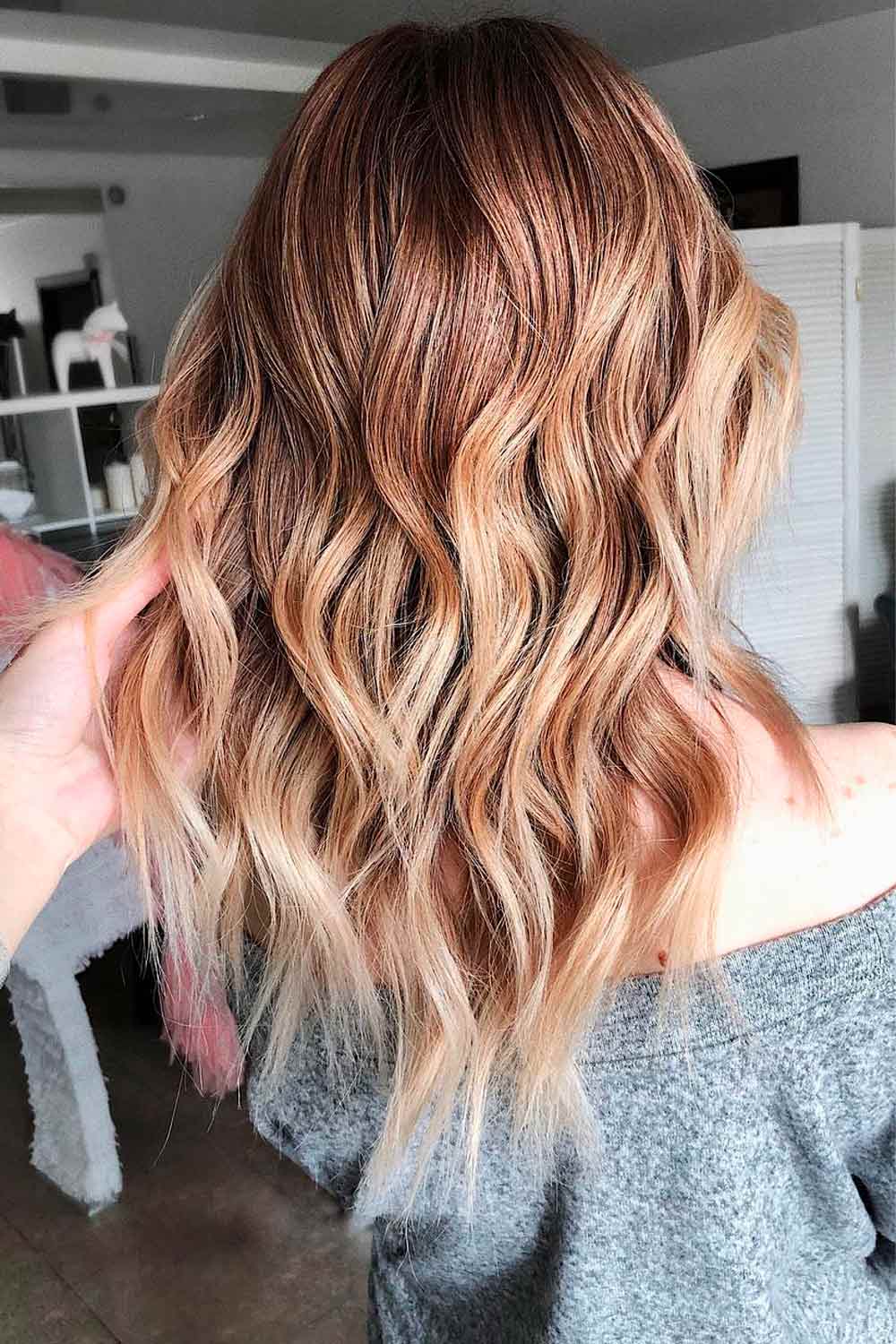 Fiery red curls, bold spring hairstyle, vibrant color