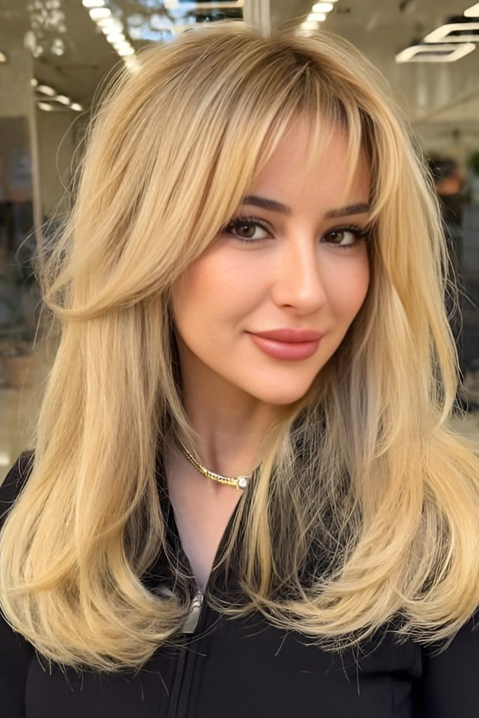 Feathered layers with soft bangs, elegant spring hairstyle