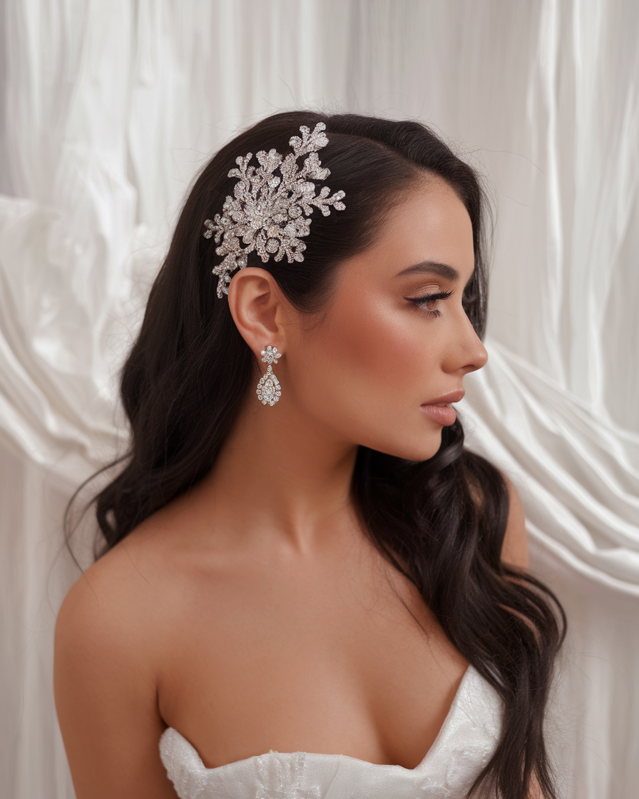 Glamorous side-swept waves with jeweled hairpiece, elegant bridal look
