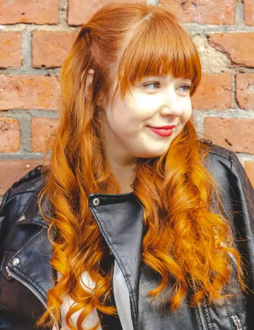 Vibrant red waves with bangs