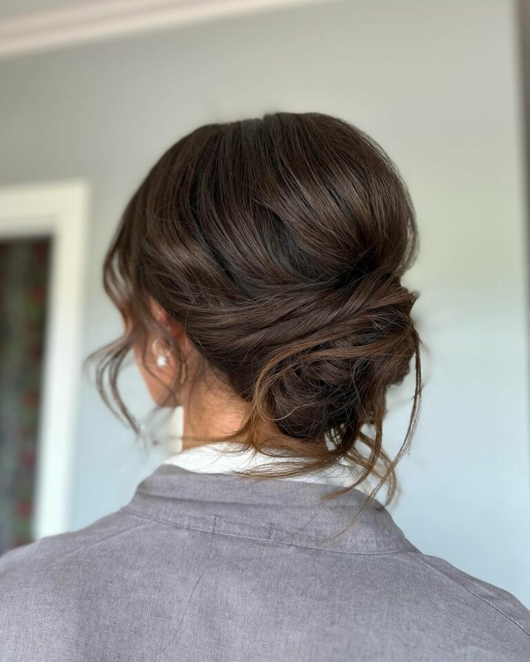 Classic low chignon with twist details