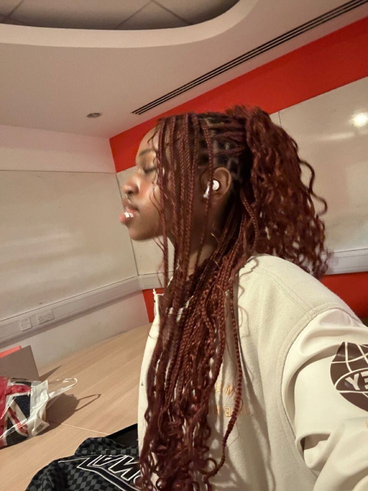 Red twist braids with half-up style