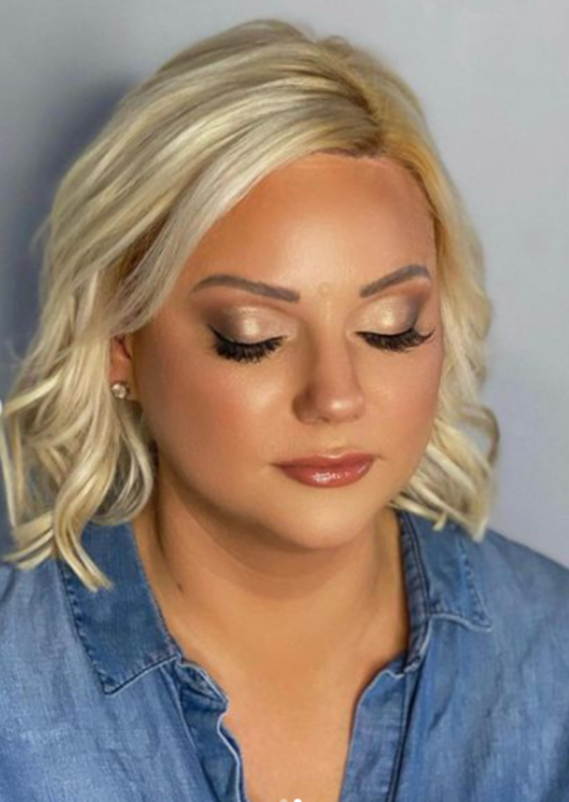 Soft glam makeup with warm tones and glossy lips