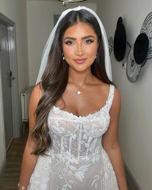 Soft bridal makeup with glowing skin and natural lips